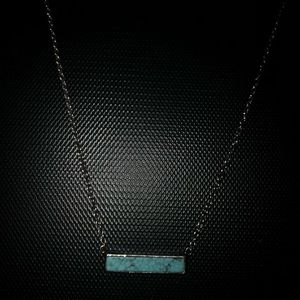 a blue marble necklace